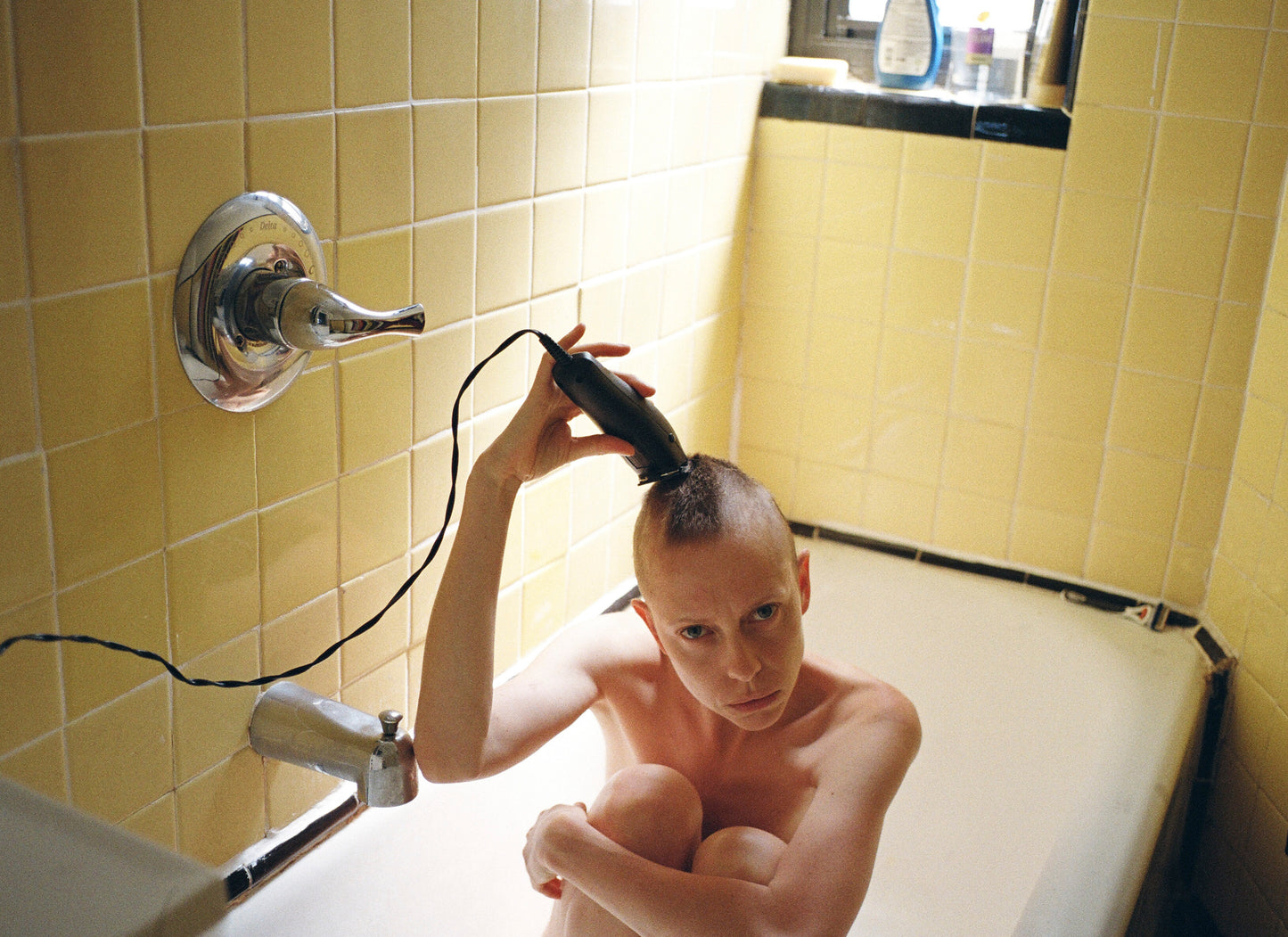 Self Portrait in Yellow Bathroom
